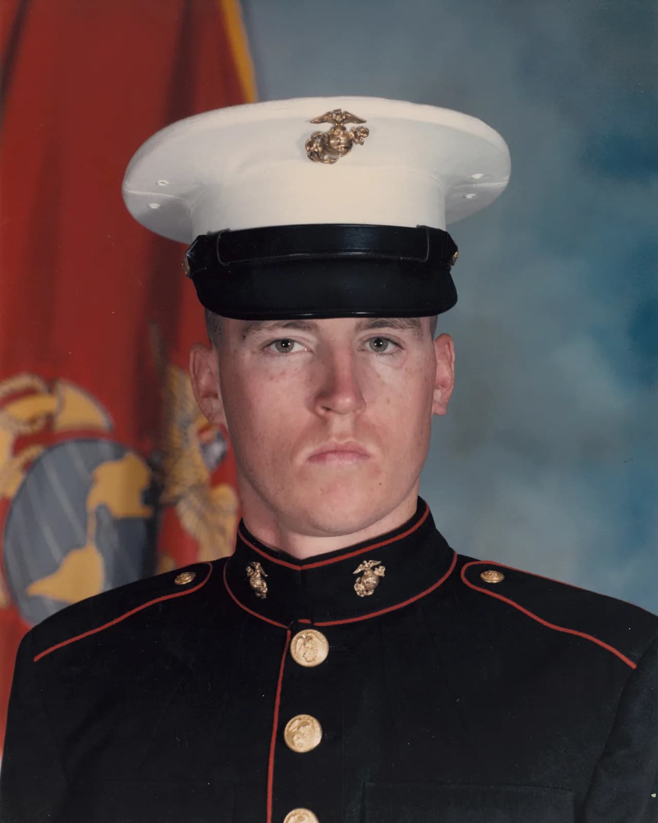 Marine in dress uniform in an archival portrait